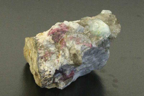 Rhodizite, liddicoatite