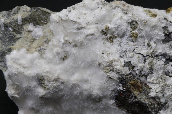 Picropharmacolite, brassite