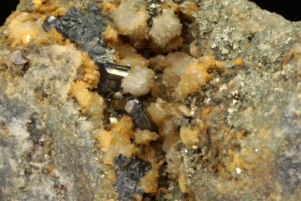 Bournonite, siderite, calcite